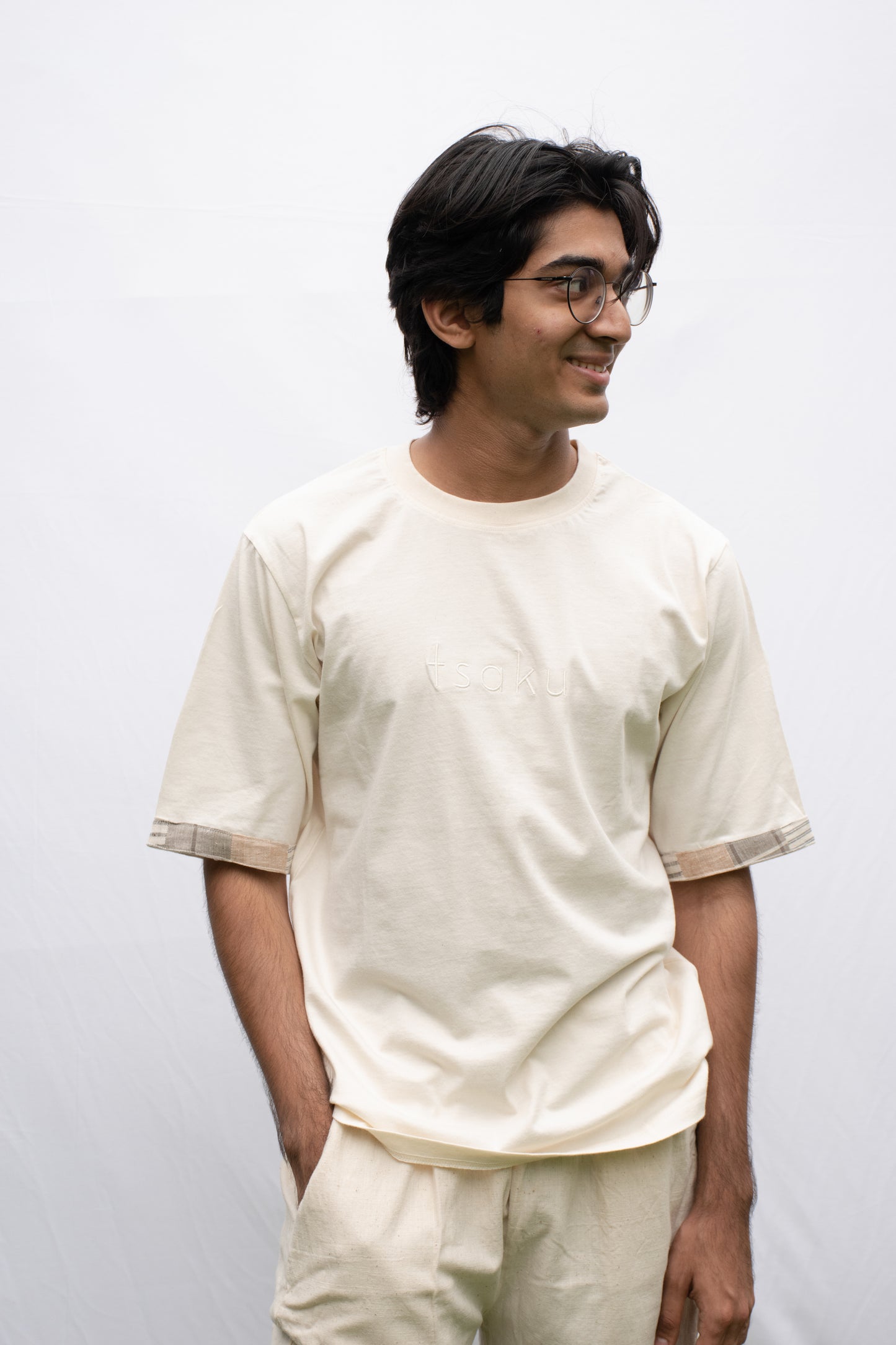 Ecru oversized t-shirt with sleeve patchwork